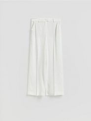 Spodnie z domieszką wełny - biały. Białe spodnie materiałowe damskie Reserved, bez wzorów, z lyocellu. Za 139.99 zł.