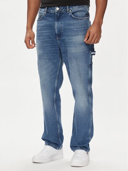 Tommy Jeans Jeansy Skater DM0DM18717 Niebieski Relaxed Fit. Niebieskie jeansy męskie Tommy Jeans. Za 389.99 zł.