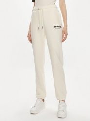 Tommy Hilfiger Spodnie dresowe Monotype WW0WW41572 Beżowy Regular Fit. Brązowe spodnie dresowe damskie Tommy Hilfiger, s, bez wzorów, z bawełny. Za 389.99 zł.