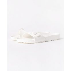 Klapki damskie Birkenstock Eva Madrid. Białe klapki damskie Birkenstock, bez wzorów, z materiału, bez obcasa. Za 276.00 zł.