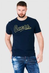 GUESS Granatowy t-shirt męski beachwear. Niebieskie t-shirty męskie Guess, m, z aplikacjami, bez kołnierzyka. W wyprzedaży za 99.99 zł.
