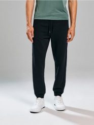 Spodnie regular fit - czarny. Czarne spodnie materiałowe męskie Sinsay, bez wzorów. Za 49.99 zł.
