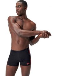 Speedo Kąpielówki "Aquashorts" w kolorze czarno-pomarańczowym rozmiar: 6. Czarne kąpielówki męskie Speedo, bez wzorów, z materiału. Za 115.95 zł.