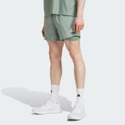 Szorty Own the Run CLIMACOOL 2-in-1. Zielone szorty męskie Adidas, bez wzorów, sportowe. Za 191.50 zł.