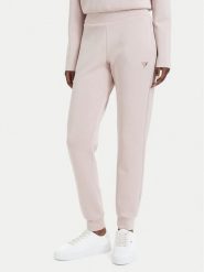 Guess Spodnie dresowe V4YB08 KCAY2 Różowy jasny Regular Fit. Czerwone spodnie dresowe damskie Guess, xxs, z aplikacjami, z dresówki. Za 344.99 zł.