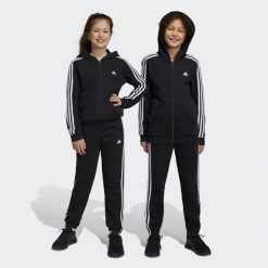 Essentials 3-Stripes Fleece Pants. Białe spodnie dresowe damskie Adidas, bez wzorów, z materiału. Za 159.00 zł.