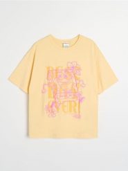 Bawełniana koszulka z nadrukiem SpongeBob - żółty. Żółte t-shirty damskie Sinsay, l, bez wzorów, z bawełny, bez kołnierzyka. Za 29.99 zł.