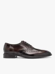 Ciemnobrązowe eleganckie półbuty. Brązowe buty wizytowe męskie Ryłko, z lakierowanej skóry, bez zapięcia. Za 499.99 zł.