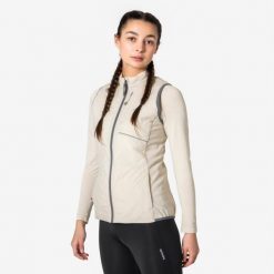 Kamizelka do biegania damska Kiprun SM Flow Run Warm ocieplana. Brązowe kamizelki damskie KIPRUN, m, z materiału, długie. Za 149.99 zł.