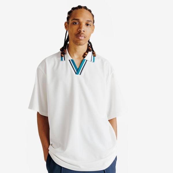 Koszulka polo oversize męska Heritage. Białe t-shirty sportowe męskie Decathlon, m, z materiału, bez ramiączek, na golfa. Za 89.99 zł.
