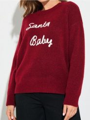 Sweter z motywem świątecznym z domieszką wełny - różowy. Czerwone swetry klasyczne damskie Sinsay, l, z wełny, bez kołnierzyka. Za 59.99 zł.