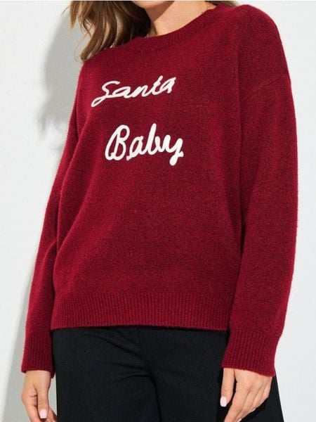 Sweter z motywem świątecznym z domieszką wełny - różowy. Czerwone swetry klasyczne damskie Sinsay, l, z wełny, bez kołnierzyka. Za 59.99 zł.