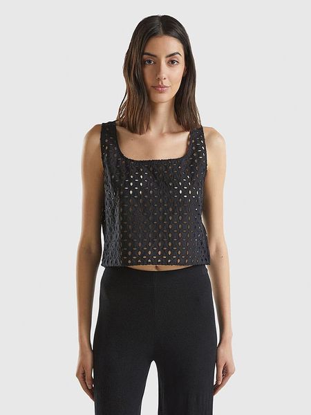 Benetton Bluzka w kolorze czarnym rozmiar: M. Czarne bluzki damskie Benetton, m, bez wzorów, bez kołnierzyka, bez ramiączek. Za 61.02 zł.