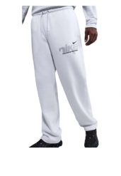 Spodnie męskie Nike Sportswear biały. Białe spodnie materiałowe męskie Nike, bez wzorów, z materiału, sportowe. Za 328.15 zł.