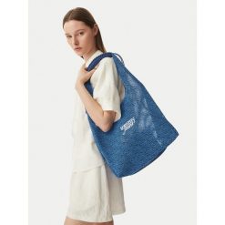 Torebka Tommy Jeans. Niebieskie torebki klasyczne damskie Tommy Jeans, bez wzorów, z jeansu, bez dodatków. Za 529.99 zł.