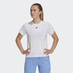 Koszulka treningowa damska adidas AEROREADY Essentials. Białe bluzki damskie Adidas, s, z materiału, bez kołnierzyka, bez ramiączek. Za 130.40 zł.