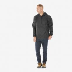 Kurtka turystyczna męska Quechua Raincut suwak pod szyją wodoodporna. Czarne kurtki męskie QUECHUA, l, bez wzorów, z materiału, sportowe, bez kaptura. Za 54.99 zł.