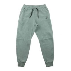 Second life - Spodnie dresowe męskie Tech Fleece o kroju slim - Jak nowy. Szare spodnie sportowe męskie Nike, z dresówki. Za 212.96 zł.