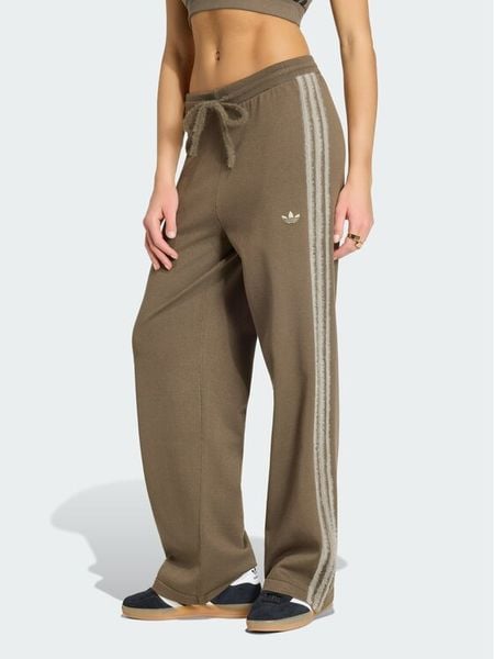 Adidas Spodnie dresowe Firebird KS7362 Brązowy Regular Fit. Brązowe spodnie dresowe damskie Adidas, xs, bez wzorów, z dresówki. Za 314.99 zł.