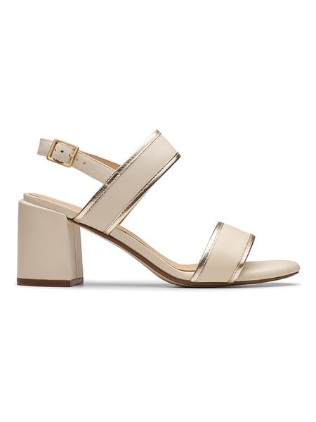 Clarks Skórzane sandały "Ezoria Sling" w kolorze złoto-beżowym na obcasie rozmiar: 37,5. Brązowe sandały damskie Clarks, bez wzorów, bez obcasa, na koturnie. Za 201.55 zł.