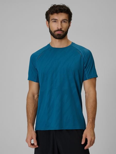 4F Koszulka do biegania szybkoschnąca męska - turkusowa XL. Niebieskie t-shirty sportowe męskie 4f, m, z tkaniny, bez ramiączek, do biegania. Za 129.99 zł.