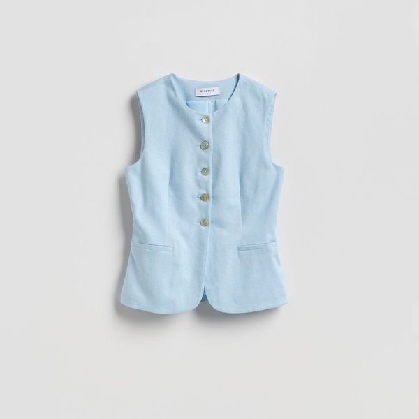 Kamizelka z lnem - jasnoniebieski. Niebieskie kamizelki damskie Reserved, l, z tkaniny. Za 129.99 zł.