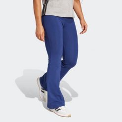 Legginsy fitness damskie ADIDAS. Niebieskie legginsy damskie Adidas, l, bez wzorów, z bawełny. Za 129.99 zł.