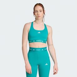 Biustonosz TECHFIT. Niebieskie biustonosze Adidas, bez wzorów, z materiału. Za 179.00 zł.