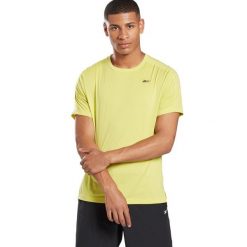 Koszulka sportowa męska Reebok Ubf Perforated. Żółte t-shirty sportowe męskie Reebok, l, z dresówki, bez ramiączek, na fitness i siłownię. Za 184.00 zł.