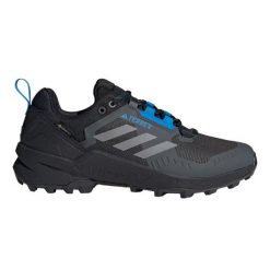 Buty adidas Terrex Swift R3 Gtx HR1311 niebieskie. Niebieskie buty trekkingowe męskie ze skóry, przed kostkę, bez zapięcia, trekkingowe, adidas terrex. Za 919.47 zł.