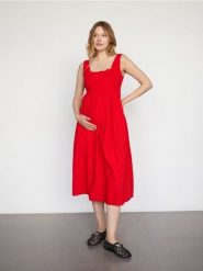 Sukienka z dodatkiem lnu - czerwony. Czerwone sukienki damskie Reserved, l, bez wzorów, z bawełny, bez kołnierzyka, bez ramiączek, rozkloszowane. W wyprzedaży za 99.99 zł.