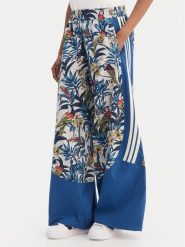 Adidas Spodnie dresowe Farm Rio Premium KD4643 Niebieski Loose Fit. Niebieskie spodnie dresowe damskie Adidas, xs, bez wzorów, z dresówki. Za 529.99 zł.