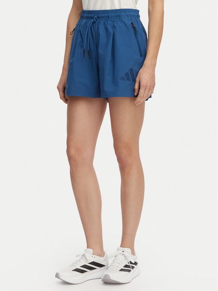 Adidas Szorty sportowe Z.N.E. KF0579 Granatowy Loose Fit. Niebieskie spodenki sportowe damskie Adidas, l, z syntetyku. Za 166.99 zł.