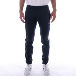 Spodnie Le Coq Sportif Saison 2 Slim Niebieskie Dorosłych. Niebieskie spodnie sportowe męskie Le Coq Sportif, z bawełny. Za 376.70 zł.