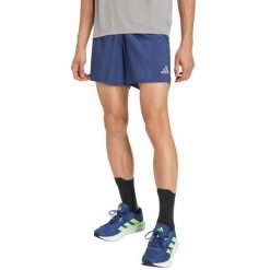Adidas Spodenki męskie Running Essentials. Niebieskie szorty męskie Adidas, bez wzorów, z materiału, klasyczne. Za 102.99 zł.