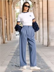 Spodnie - niebieski. Niebieskie spodnie materiałowe damskie Sinsay, bez wzorów, z materiału. Za 69.99 zł.