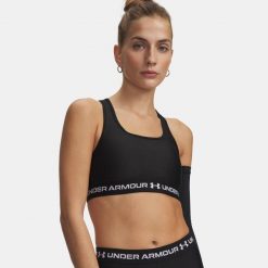 Biustonosz treningowy Under Armour Crossback Mid ultimate black/white. Czarne biustonosze sportowe damskie Under Armour, bez wzorów. Za 99.99 zł.