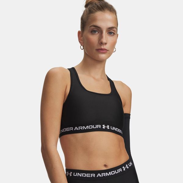 Biustonosz treningowy Under Armour Crossback Mid ultimate black/white. Czarne biustonosze sportowe damskie Under Armour, bez wzorów. Za 99.99 zł.