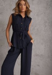 Granatowy Komplet z Wiskozy Spodnie Wide Leg i Koszula Bez Rękawów z Paskiem Adduin. Niebieskie spodnie materiałowe damskie Renee, bez wzorów, z tkaniny. Za 139.99 zł.