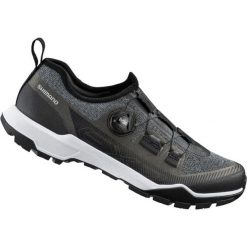 Buty do rowerów turystycznych EX700, czarne. Czarne buty trekkingowe męskie SHIMANO, z gumy, bez zapięcia, rowerowe. Za 716.65 zł.