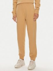 Calvin Klein Spodnie dresowe Nano Logo K20K207214 Beżowy Relaxed Fit. Brązowe spodnie dresowe damskie CALVIN KLEIN, l, bez wzorów, z bawełny. Za 249.99 zł.
