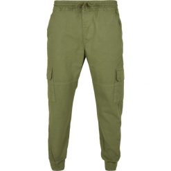 Spodnie Urban Classics military. Zielone spodnie materiałowe męskie Urban Classics, bez wzorów, militarne. Za 211.55 zł.
