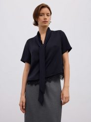 BGN Bluzka w kolorze czarnym rozmiar: 34. Czarne bluzki damskie BGN, bez wzorów, z koronki, bez kołnierzyka, bez ramiączek. Za 91.77 zł.