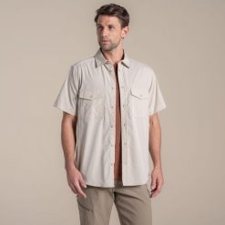 Koszula Craghoppers Kiwi II. Białe koszule męskie CRAGHOPPERS, m, bez wzorów, bez kołnierzyka, bez ramiączek. Za 214.10 zł.