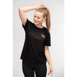 T-shirt do jogi Moonholi Awaken z krótkim rękawem. Czarne t-shirty damskie MOONHOLI, s, bez wzorów, bez kołnierzyka. Za 99.00 zł.