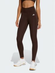 Adidas Legginsy Optimé Essentials Stash JZ0824 Brązowy Slim Fit. Brązowe legginsy sportowe damskie Adidas, xs, bez wzorów, z syntetyku, na fitness i siłownię. Za 199.99 zł.