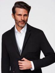 Marynarka męska SLIM z dzianiny o subtelnej strukturze – czarna V2. Czarne marynarki męskie Ombre Clothing, bez wzorów, z dzianiny. W wyprzedaży za 314.99 zł.