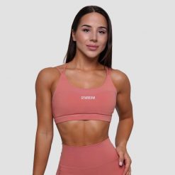 Biustonosz sportowy damski fitness bez zapięcia łososiowy FIT. Czerwone biustonosze sportowe damskie GYMBEAM, bez wzorów, z elastanu. Za 85.90 zł.