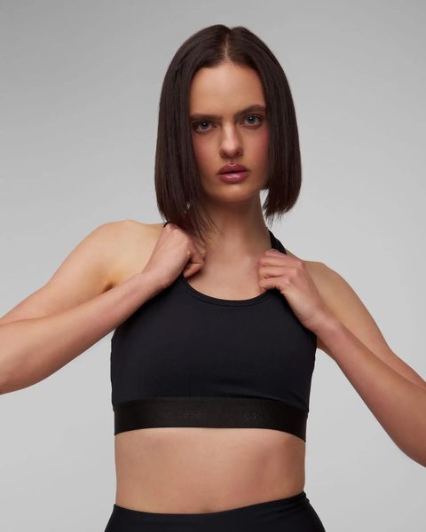 Stanik Casall Graphic Sports Bra. Czarne biustonosze sportowe damskie Casall, bez wzorów, z materiału. Za 119.00 zł.