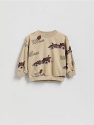 Bluza oversize z nadrukiem - beżowy. Brązowe bluzy i bluzki niemowlęce Reserved, bez wzorów, z bawełny, bez ramiączek, bez kaptura. Za 39.99 zł.